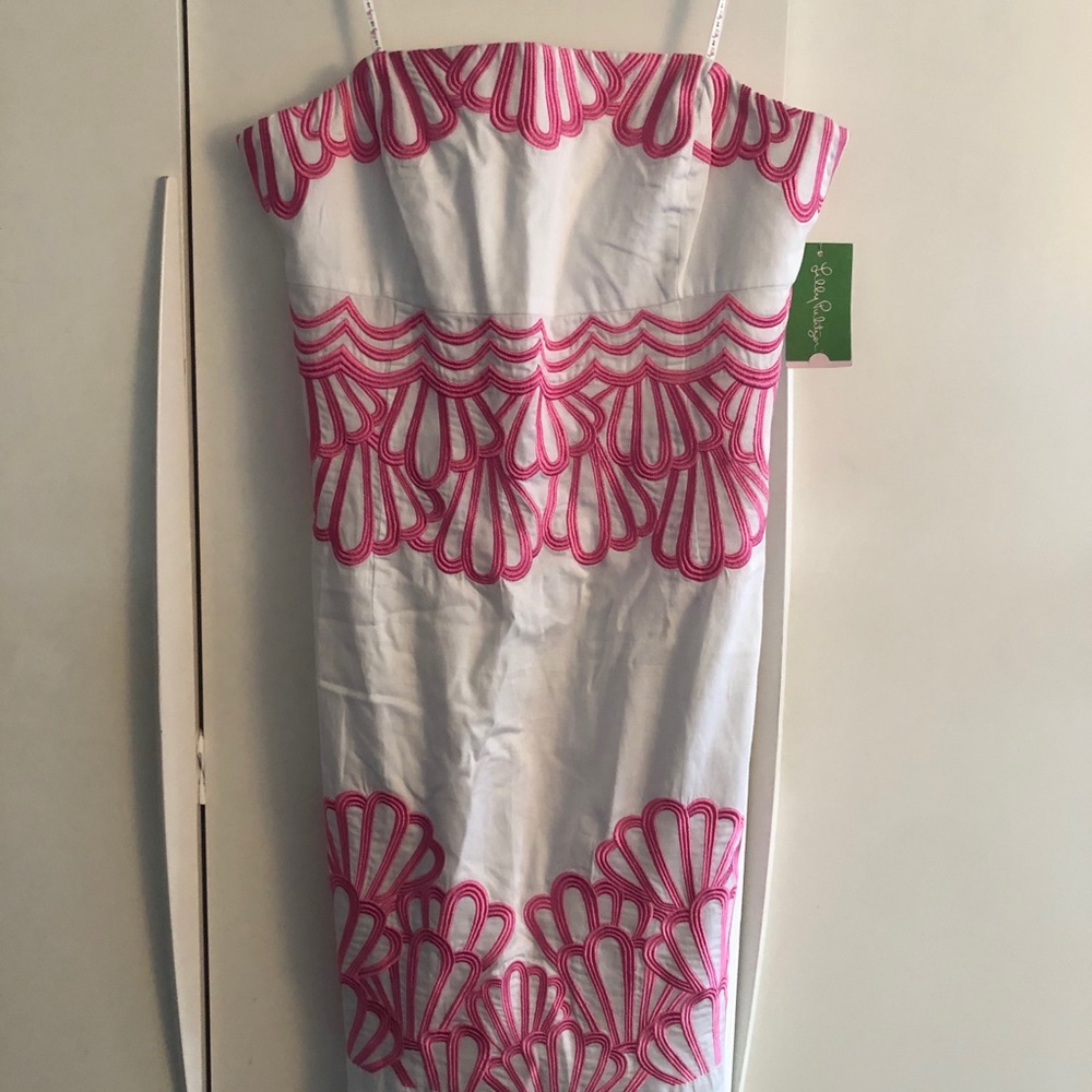 Lilly white with pink embroidery